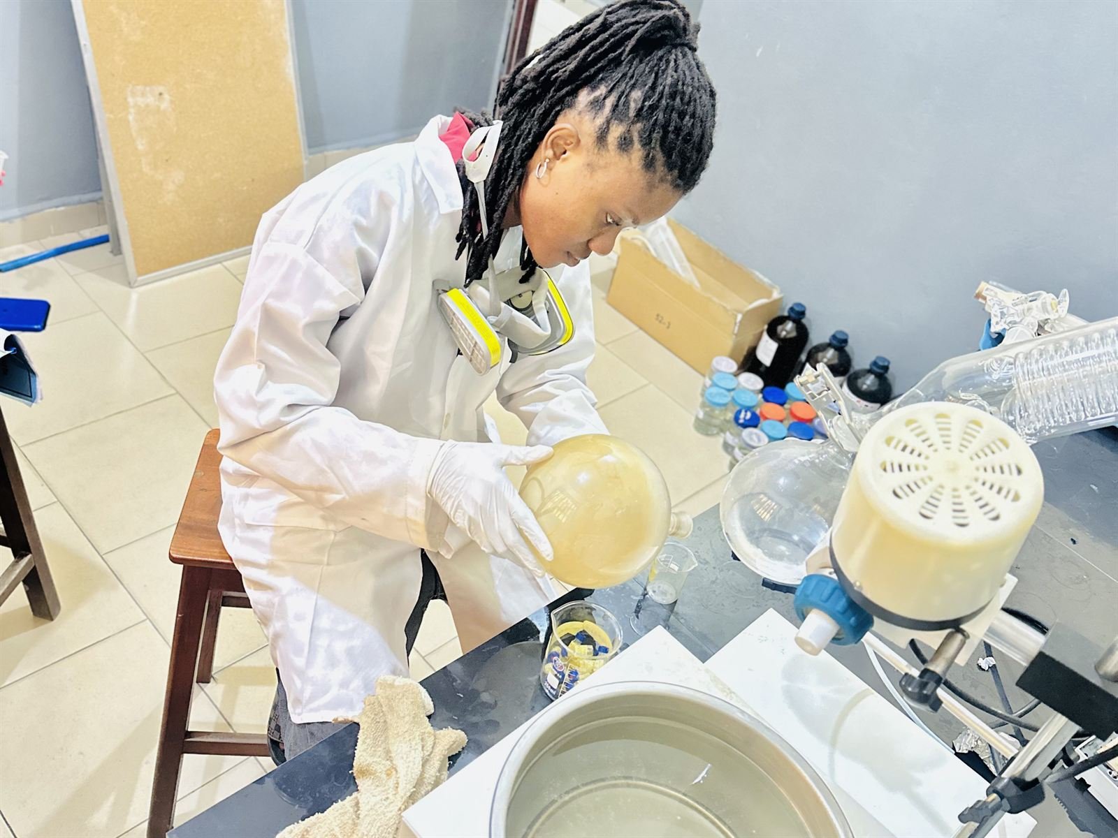 Analyst carrying out an instrument analysis in the laboratory