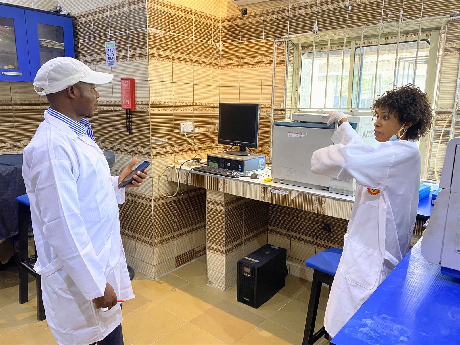 Quatenary analysts reviewing laboratory results